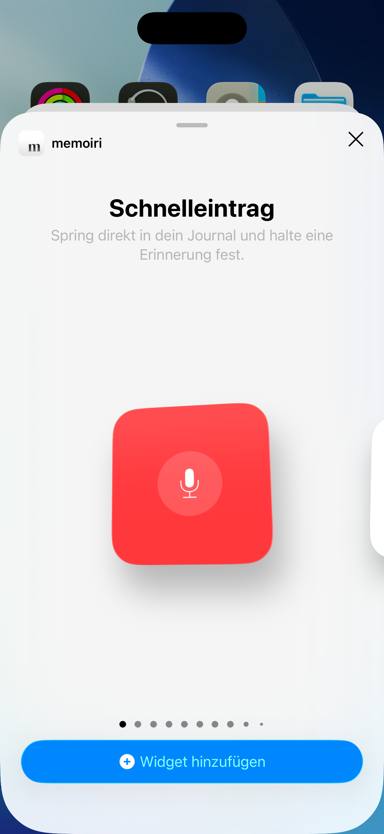 A red memoir quick-capture widget with a white microphone in the iPhone widget gallery.
